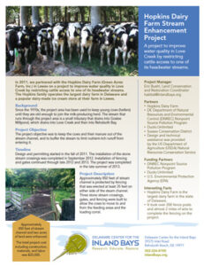 a brochure with cows in the background